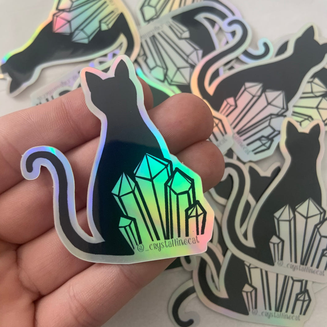 Holographic Crystals and Cats Sticker